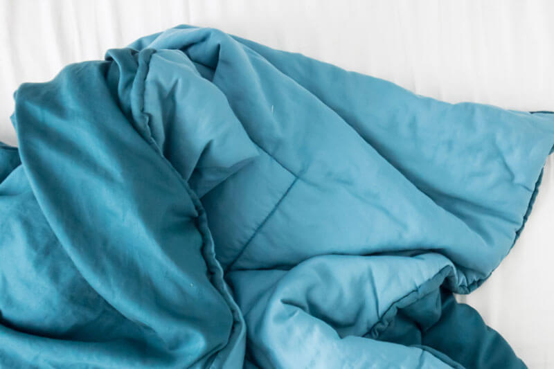 Weighted blankets can provide both mental and physical comfort.